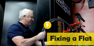 Greg Lemond fixing a flat tyre