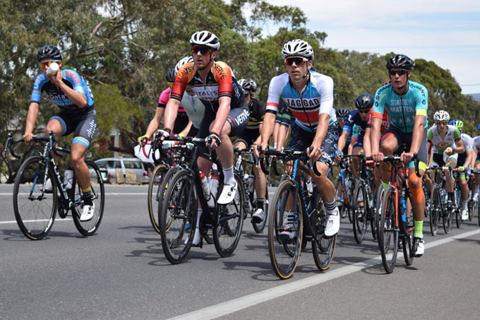 As the break was racing away to a 5 minute lead on lap 3 the local and NRS riders led the bunch